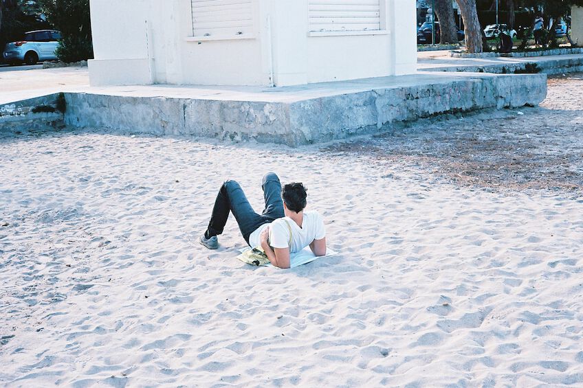 Man resting in the sand